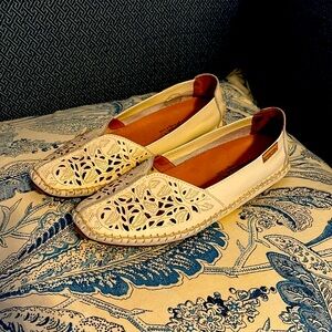 Cream colored, women’s Pikolinos flats worn twice.